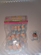 12  cold porcelain sleeping baby with crown royalty theme  on tulle for capia
