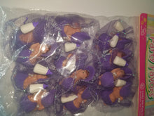 12 cold porcelain  sleeping baby with cap on circle of tulle capias