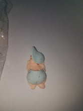 12  large cold porcelain sleeping baby with cap 2 inches