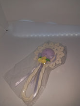Cold porcelain baby rattle caketopper