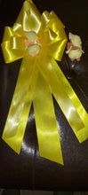 Yellow mom to be corsage